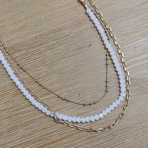 Gold triple chain necklace white beads